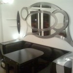 Kitchen Unit with Artistic Mirror and Folding Table and Chairs